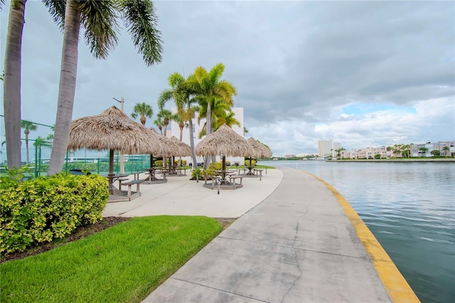 view of community with a gazebo and a water view