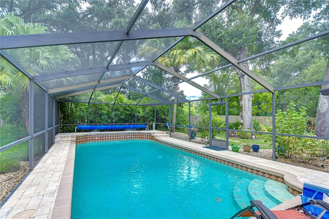 view of pool featuring a lanai