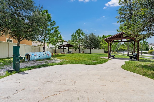 surrounding community featuring a gazebo and a yard