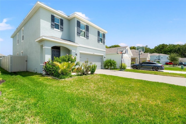 view of front of house featuring a front lawn and a garage