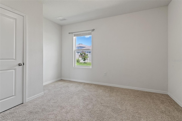 empty room featuring carpet