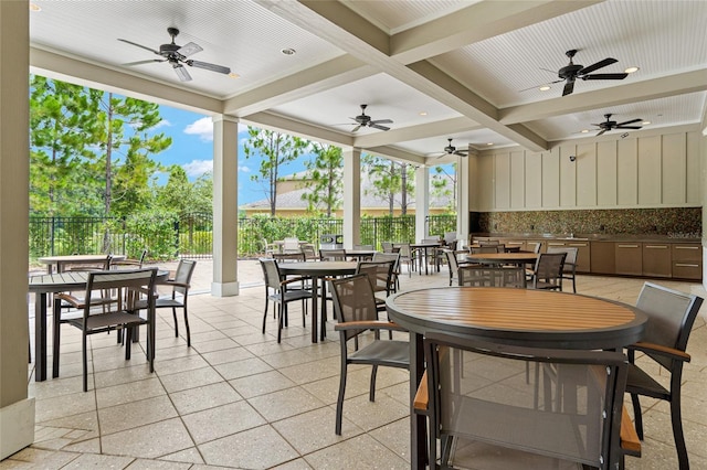 view of patio / terrace featuring ceiling fan