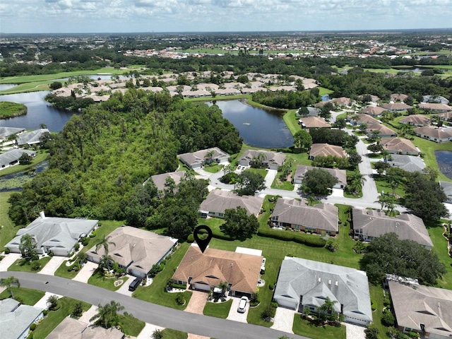 drone / aerial view with a water view