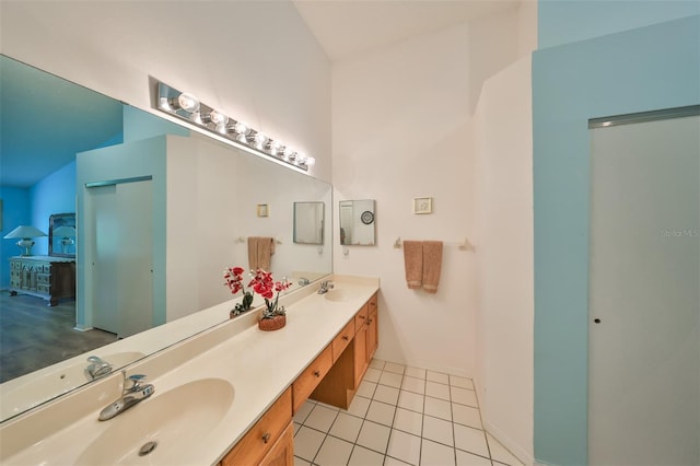 bathroom featuring tile patterned floors and vanity