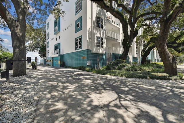 view of property with fence