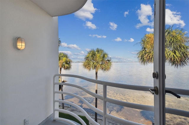 balcony featuring a water view