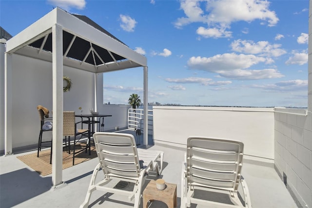 view of patio / terrace with a balcony