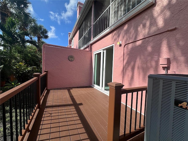 wooden terrace with central air condition unit