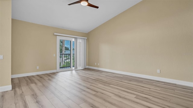 unfurnished room featuring ceiling fan, lofted ceiling, and light hardwood / wood-style flooring