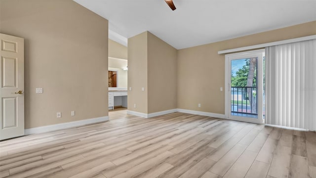 spare room featuring ceiling fan and light hardwood / wood-style flooring