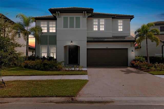 view of front of property with a garage