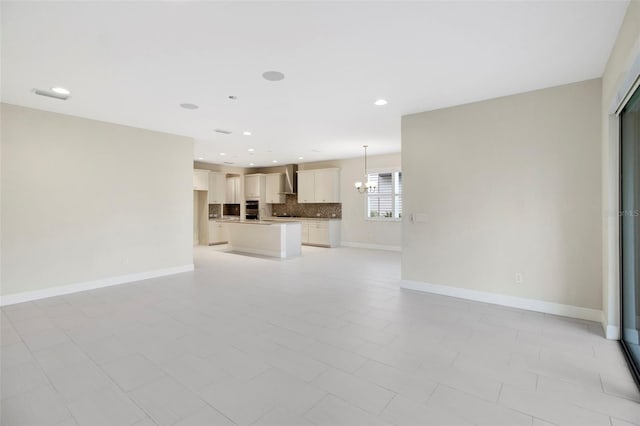 unfurnished living room featuring light tile patterned flooring