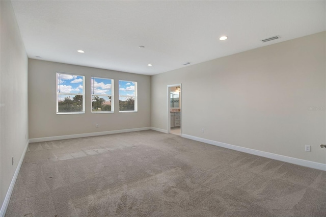 view of carpeted spare room