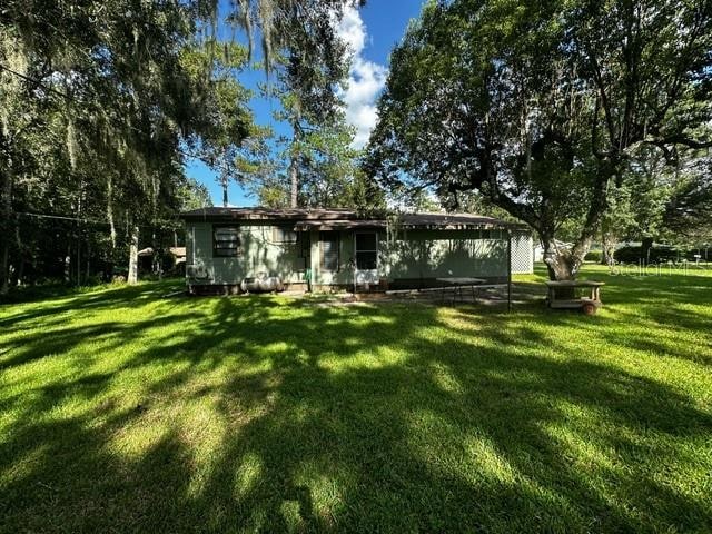 exterior space with a lawn