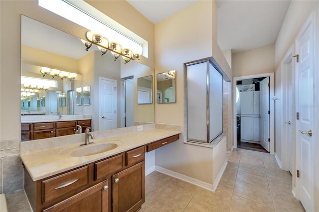 bathroom with tile patterned flooring and vanity