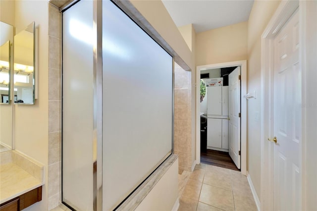 bathroom featuring tile patterned flooring and vanity