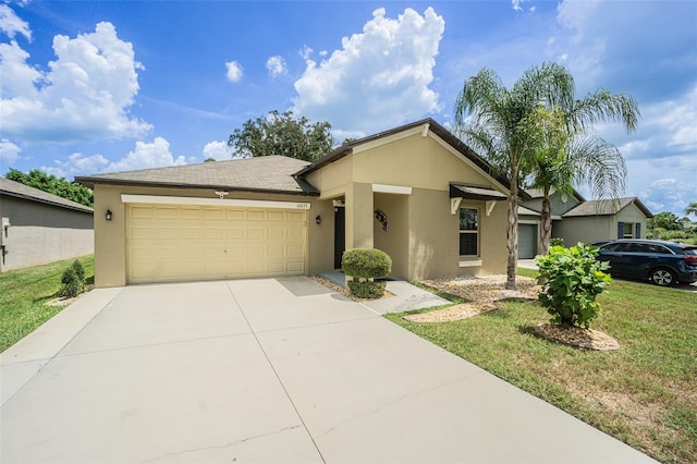 ranch-style home featuring a front lawn and a garage