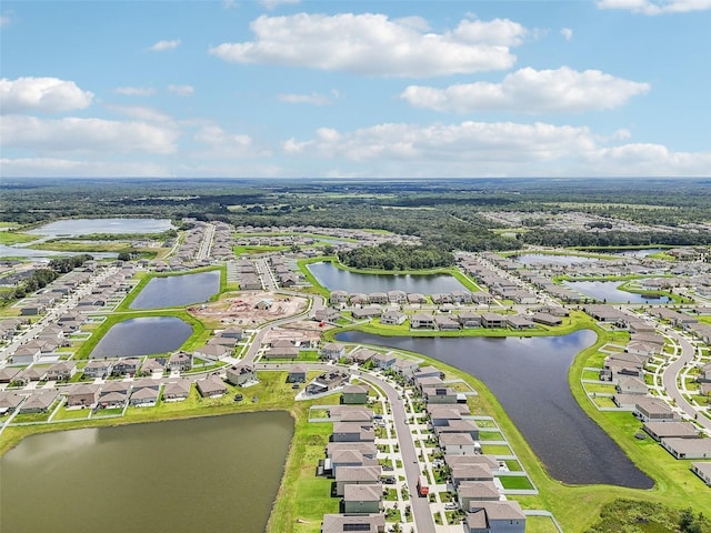 aerial view with a water view and a residential view