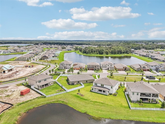 drone / aerial view with a water view