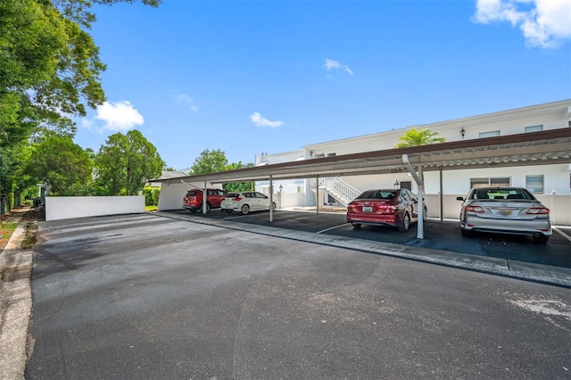 view of parking with a carport