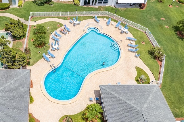 pool featuring a patio area and fence