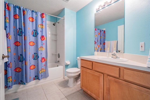 full bathroom featuring tile patterned flooring, shower / bath combo, toilet, vanity, and a textured ceiling