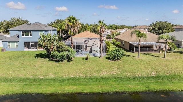 exterior space featuring central AC, a pool, and a lanai