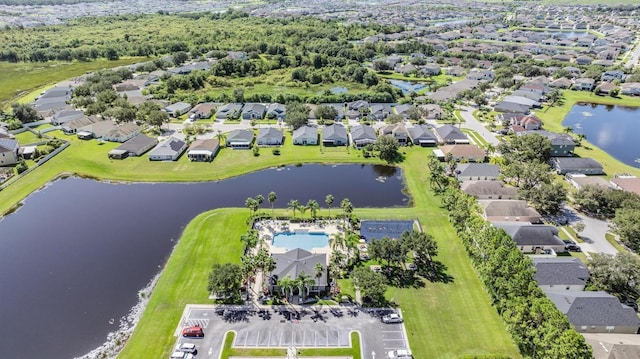 aerial view featuring a residential view and a water view