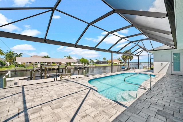 view of pool featuring a lanai, a water view, a patio, and a boat dock