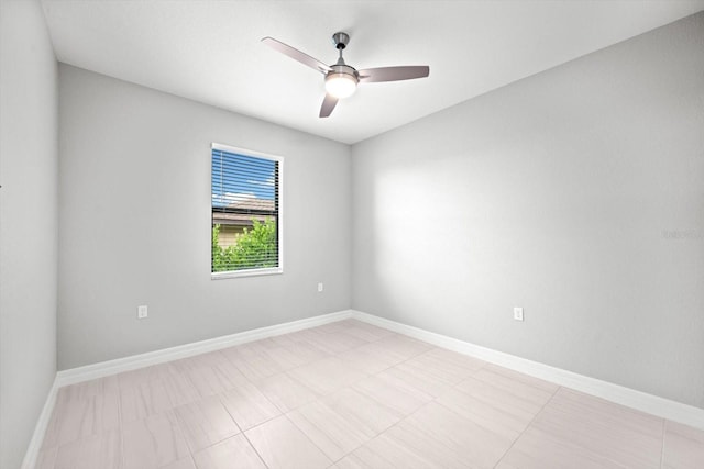 spare room featuring ceiling fan