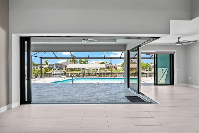 view of swimming pool featuring ceiling fan