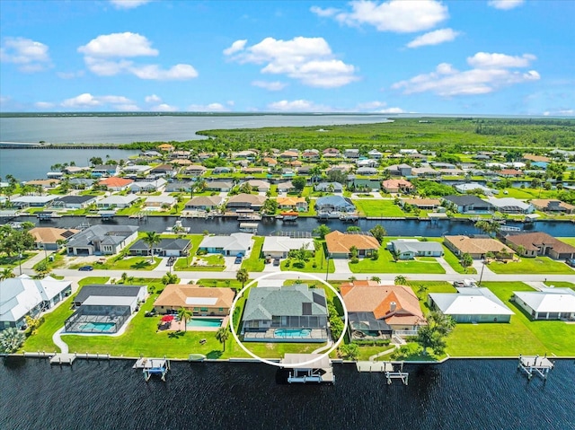 drone / aerial view featuring a water view