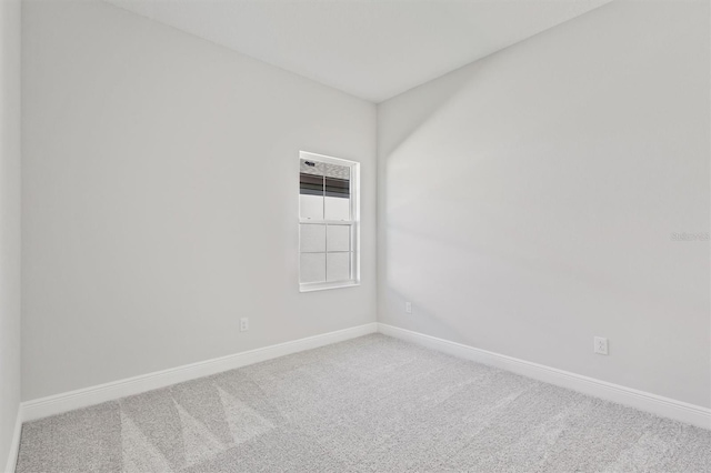 spare room with carpet flooring