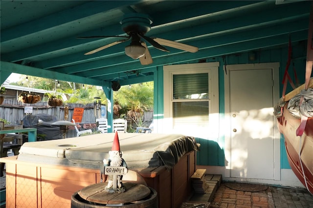 view of patio featuring a grill and ceiling fan