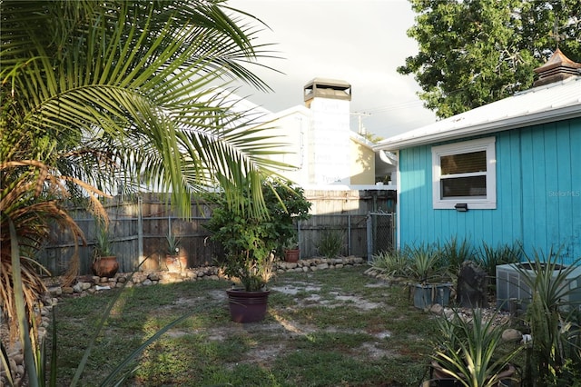 view of yard with central AC unit