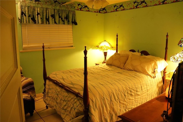 bedroom with light tile patterned flooring