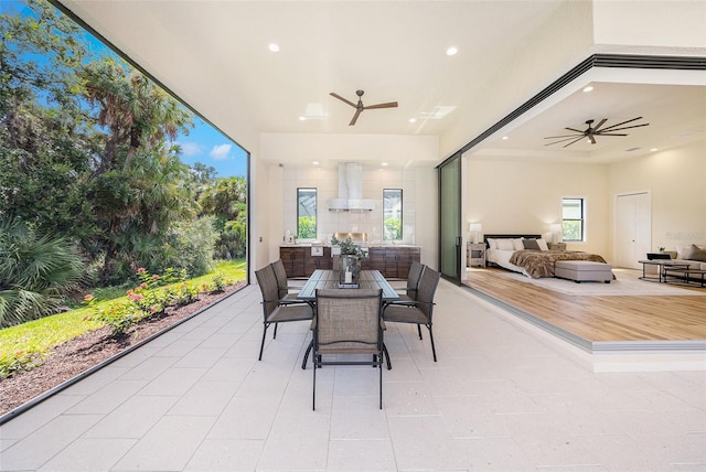 view of patio / terrace with ceiling fan and an outdoor living space