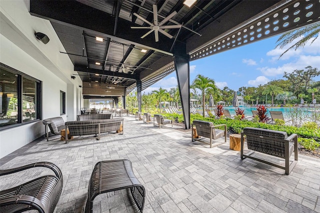 view of patio featuring outdoor lounge area and ceiling fan