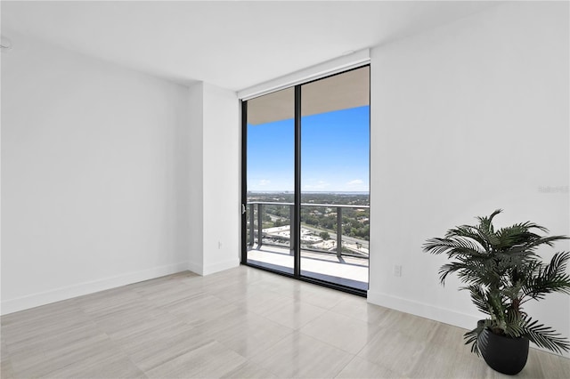 empty room with floor to ceiling windows