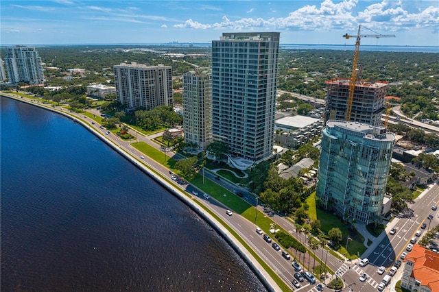 birds eye view of property featuring a water view