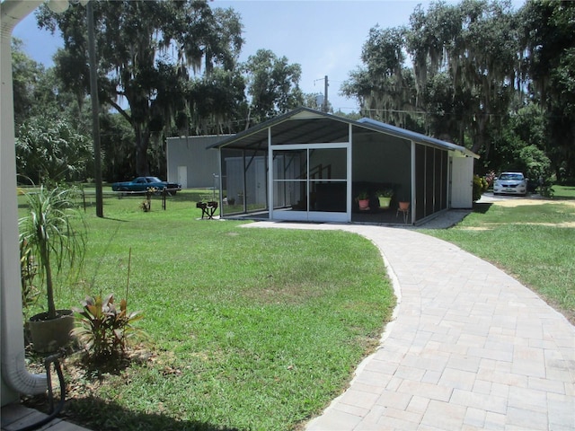 exterior space featuring a sunroom