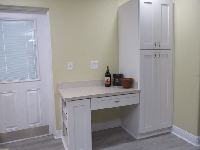 interior space with hardwood / wood-style flooring