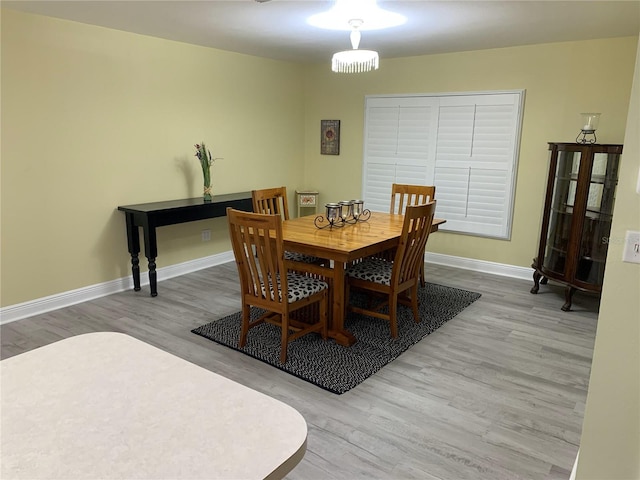 dining room featuring light hardwood / wood-style flooring