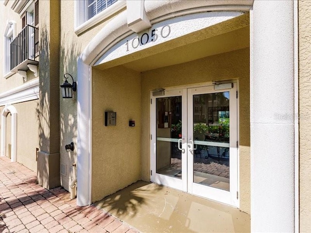 entrance to property with french doors