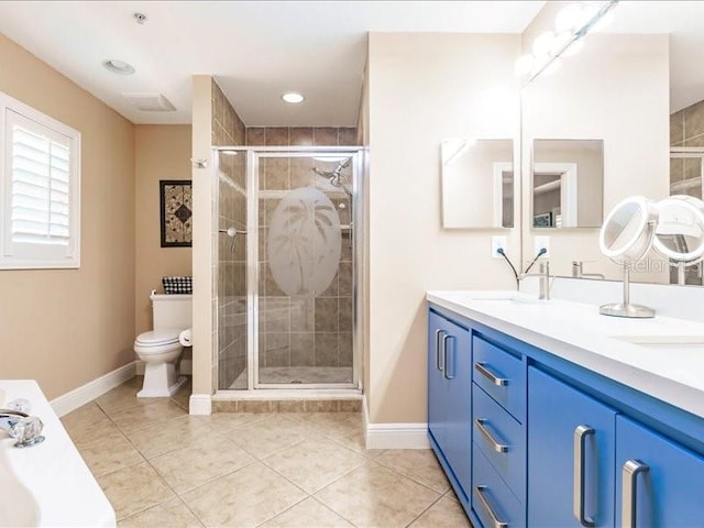 bathroom with vanity, toilet, an enclosed shower, and tile patterned floors