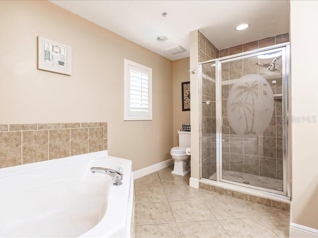 bathroom with separate shower and tub, toilet, and tile patterned floors