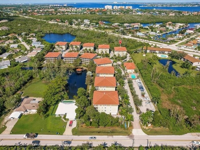 drone / aerial view with a water view