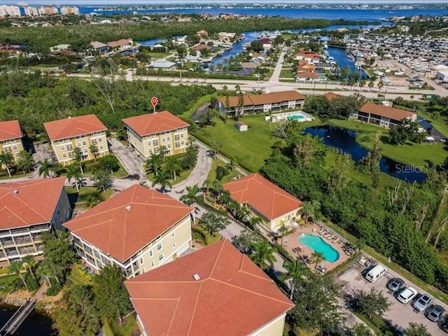 birds eye view of property featuring a water view