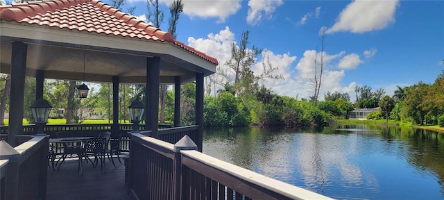 dock area featuring a gazebo and a water view