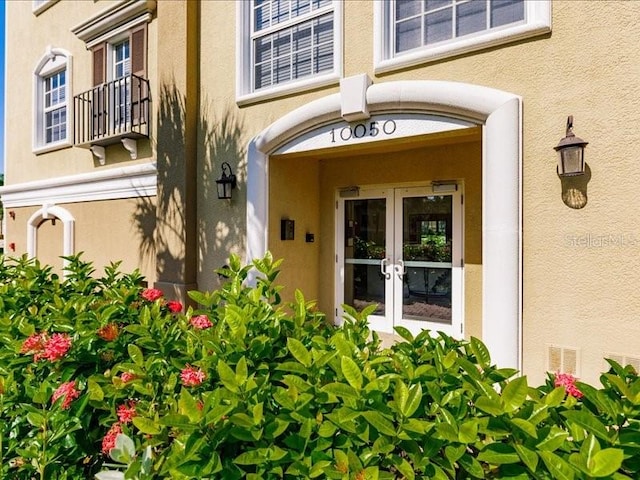 doorway to property with french doors